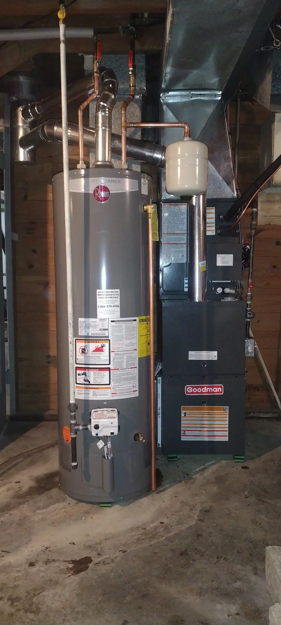 Installed Rheem water heater and Goodman furnace with copper piping in basement